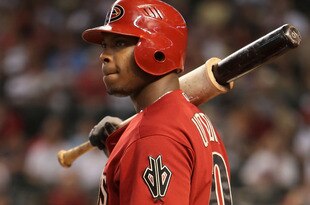 PHOENIX - JULY 26:  Justin Upton #10 of the Arizona Diamondbacks waits to bat during the major league baseball game against the Pittsburgh Pirates at Chase Field on July 26, 2009 in Phoenix, Arizona. The Diamondbacks defeated the Pirates 9-0.  (Photo by Christian Petersen/Getty Images)