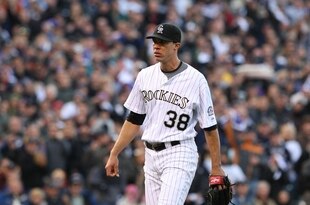 DENVER - OCTOBER 11:  Ubaldo Jimenez #38 of the Colorado Rockies leaves the game against the Philadelphia Phillies in the seventh inning in Game Four of the NLDS during the 2009 MLB Playoffs at Coors Field on October 12, 2009 in Denver, Colorado.  (Photo by Jed Jacobsohn/Getty Images)