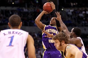OKLAHOMA CITY - MARCH 20:  Kwadzo Ahelegbe #11 of the Northern Iowa Panthers attempts a shot against the Kansas Jayhawks during the second round of the 2010 NCAA men's basketball tournament at Ford Center on March 20, 2010 in Oklahoma City, Oklahoma.  (Photo by Ronald Martinez/Getty Images)