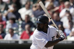 DETROIT - APRIL 13:  Dmitri Young #25 of the Detroit Tigers bats against the Chicago White Sox at Comerica Park on April 13, 2006 in Detroit, Michigan. The White Sox defeated the Tigers 13-9. (Photo by Tom Pidgeon/Getty Images)