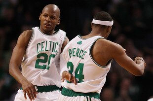 BOSTON - MARCH 07:  Ray Allen #20 of the Boston Celtics celebrates his game winning three point shot with teammate Paul Pierce #34 in the fourth quarter against the Washington Wizards on March 7, 2010 at the TD Garden in Boston, Massachusetts. The Celtics defeated the Wizards 86-83. NOTE TO USER: User expressly acknowledges and agrees that, by downloading and or using this photograph, User is consenting to the terms and conditions of the Getty Images License Agreement.  (Photo by Elsa/Getty Images)