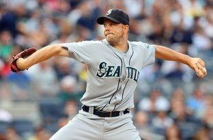 NEW YORK - JULY 01:  Jarrod Washburn #56 of the Seattle Mariners pitches against the New York Yankees on July 1, 2009 at Yankee Stadium in the Bronx borough of New York City.  (Photo by Jim McIsaac/Getty Images)