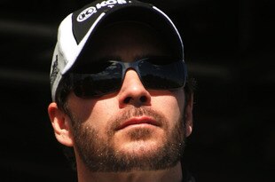 LAS VEGAS - FEBRUARY 28:  Jimmie Johnson, driver of the #48 Lowe's/Kobalt Tools Chevrolet, stands by prerace stage prior to the NASCAR Sprint Cup Series Shelby American at Las Vegas Motor Speedway on February 28, 2010 in Las Vegas, Nevada.  (Photo by Jerry Markland/Getty Images for NASCAR)