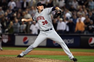 NEW YORK - OCTOBER 09: Joe Nathan #36 of the Minnesota Twins pitches against the New York Yankees in Game Two of the ALDS during the 2009 MLB Playoffs at Yankee Stadium on October 9, 2009 in the Bronx borough of New York City. (Photo by Jim McIsaac/Getty Images)