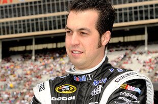 ATLANTA - MARCH 07:  Sam Hornish Jr. , driver of the #77 Mobil 1 Dodge, stands on the grid prior to the start of the NASCAR Sprint Cup Series Kobalt Tools 500 at Atlanta Motor Speedway on March 7, 2010 in Hampton, Georgia.  (Photo by John Harrelson/Getty Images)