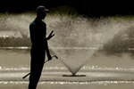 RABAT, MOROCCO - MARCH 21:  Rhys Davies of Wales jestures as he putts on the 12th green during the final round of the Hassan II Golf Trophy at Royal Golf Dar Es Salam on March 21, 2010 in Rabat, Morocco.  (Photo by Richard Heathcote/Getty Images)