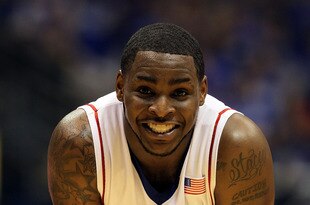 LAWRENCE, KS - MARCH 03:  Sherron Collins #4 of the Kansas Jayhawks smiles while waiting for a free throw during the game against the Kansas State Wildcats on March 3, 2010 at Allen Fieldhouse in Lawrence, Kansas.  (Photo by Jamie Squire/Getty Images)