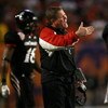 MIAMI - JANUARY 01:  Head coach Brian Kelly of the Cincinnati Bearcats shouts on the field against the Virginia Tech Hokies during the FedEx Orange Bowl at Dolphin Stadium on January 1, 2009 in Miami, Florida.  (Photo by Doug Benc/Getty Images)