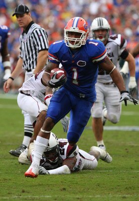 15 November 2008: Florida Gators Percy Harvin breaks through the line for his first touchdown in the first half of Saturday's game between the  Florida Gators and the South Carolina Gamecocks in Gainesville, Florida.