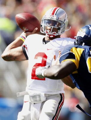 CLEVELAND - SEPTEMBER 19:  Terrelle Pryor #2 of the Ohio State Buckeyes throws a second quarter pass while playing the Toledeo Rockets on September 19, 2009 at Cleveland Browns Stadium in Cleveland, Ohio. Ohio State won the game 38-0.  (Photo by Gregory S