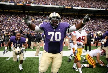 SEATTLE - SEPTEMBER 19:  Offensive guard Morgan Rosborough #70 of the Washington Huskies celebrates as time expires against the USC Trojans on September 19, 2009 at Husky Stadium in Seattle, Washington. The Huskies defeated the Trojans 16-13. (Photo by Ot