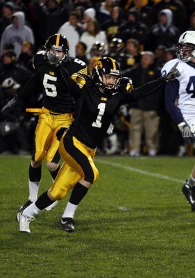 IOWA CITY, IA - NOVEMBER 8:  Iowa Kicker Daniel Murray #1 celebrates with teammate Ryan Donahue #5 after kicking the game winning field goal defeating Penn State Nittany Lions with six seconds left on the clock at Kinnick Stadium on November 8, 2008 in Io
