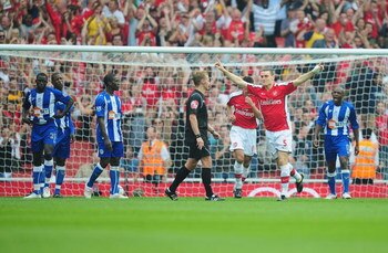 LONDON, ENGLAND - SEPTEMBER 19:  Thomas Vermaelen of Arsenal celebrates his second goal during the Barclays Premier League match between Arsenal and Wigan Athletic at the Emirates Stadium on September 19, 2009 in London, England.  (Photo by Clive Mason/Ge