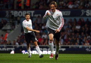 LONDON, ENGLAND - SEPTEMBER 19:  Fernando Torres of Liverpool celebrates scoring the third goal during the Barclays Premier League match between West Ham United and Liverpool at Upton Park on September 19, 2009 in London, England.  (Photo by Jamie McDonal