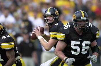 IOWA CITY, IOWA - SEPTEMBER 29:  Quarterback Kyle McCann #4 of the Iowa Hawkeyes prepares to throw against the Penn State Nittany Lions during the game at Kinnick Stadium in Iowa City, Iowa on September 29, 2001.  Iowa defeated Penn State 24-18.  (Photo b