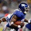 ARLINGTON, TX - SEPTEMBER 20:  Running back Brandon Jacobs #27 of the New York Giants runs the ball against the Dallas Cowboys at Cowboys Stadium on September 20, 2009 in Arlington, Texas.  (Photo by Ronald Martinez/Getty Images)
