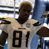 SAN DIEGO - SEPTEMBER 20: Kassim Osgood #81 of the San Diego Chargers flexes for the camera before running onto the feild to play against the Baltimore Ravens at Qualcomm Stadium on September 20, 2009 in San Diego, California.  (Photo by Jacob de Golish/G