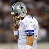 ARLINGTON, TX - SEPTEMBER 20:  Quarterback Tony Romo #9 of the Dallas Cowboys walks off the field during play against the New York Giants at Cowboys Stadium on September 20, 2009 in Arlington, Texas.  (Photo by Ronald Martinez/Getty Images)