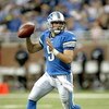 DETROIT - SEPTEMBER 20:  Quarterback Matthew Stafford #9 of the Detroit Lions rolls out as he looks to pass against the Minnesota Vikings at Ford Field on September 20, 2009 in Detroit, Michigan.  (Photo by Stephen Dunn/Getty Images)