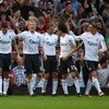 LONDON, ENGLAND - SEPTEMBER 19:  Liverpool players celebrate after Dirk Kuyt of Liverpool scored the second goal during the Barclays Premier League match between West Ham United and Liverpool at Upton Park on September 19, 2009 in London, England.  (Photo