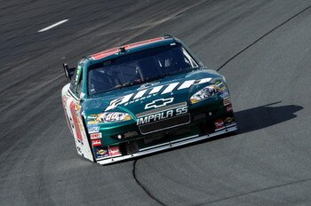 LOUDON, NH - SEPTEMBER 18:  Dale Earnhardt Jr., driver of the #88 AMP Energy/National Guard Chevrolet, rounds turn two during practice for the NASCAR Sprint Cup Series Sylvania 300 at the New Hampshire Motor Speedway on September 18, 2009 in Loudon, New H