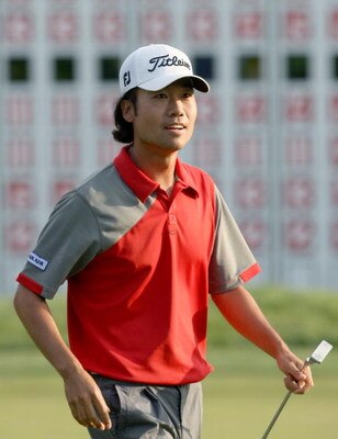 NORTON, MA - SEPTEMBER 7:  Kevin Na smiles after he finished the final round of the the Deutsche Bank Championship held at TPC Boston on September 7, 2009 in Norton, Massachusetts. (Photo by Jim Rogash/Getty Images)
