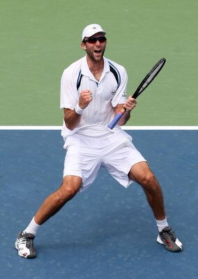 CINCINNATI - AUGUST 17:  Ivo Karlovic of Croatia celebrates winning match point against Gael Monfils of France during day one of the Western & Southern Financial Group Masters on August 17, 2009 at the Lindner Family Tennis Center in Cincinnati, Ohio.  (P
