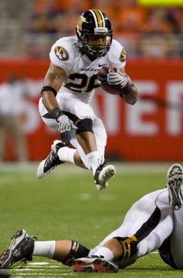 ST. LOUIS, MO - SEPTEMBER 5: De'Vion Washington #26 of the University of Missouri Tigers rushes against the University of Illinois Fighting Illini during the State Farm Arch Rivalry on September 5, 2009 at the Edward Jones Dome in St. Louis, Missouri.  Th