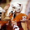 AUSTIN, TX - SEPTEMBER 19:  Quarterback Colt McCoy #12 of the Texas Longhorns celebrates a touchdown against the Texas Tech Red Raiders at Darrell K Royal-Texas Memorial Stadium on September 19, 2009 in Austin, Texas.  (Photo by Ronald Martinez/Getty Imag