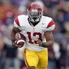 SEATTLE - SEPTEMBER 19:  Stafon Johnson #13 of the USC Trojans carries the ball during the game against the Washington Huskies on September 19, 2009 at Husky Stadium in Seattle, Washington. The Huskies defeated the Trojans 16-13. (Photo by Otto Greule Jr/