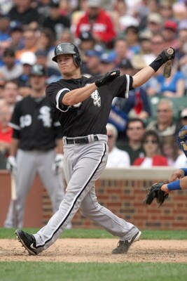 CHICAGO - JUNE 17: Gordon Beckham #15 of the Chicago White Sox swings against the Chicago Cubs on June 17, 2009 at Wrigley Field in Chicago, Illinois. (Photo by Jonathan Daniel/Getty Images)