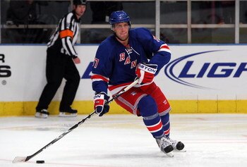 NEW YORK - SEPTEMBER 24:  Matt Gilroy #97 of the New York Rangers skates against the Washington Capitals during their preseason game on  September 24, 2009 at Madison Square Garden in New York City.  (Photo by Jim McIsaac/Getty Images)