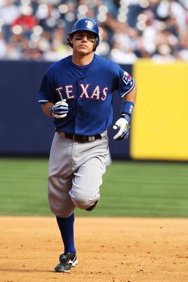 NEW YORK - AUGUST 27:  Ian Kinsler #5 of The Texas Rangers rounds the bases after hitting a home run against the New York Yankees during their game on August 27th, 2009 at Yankee Stadium in the Bronx Borough of New York.  (Photo by Al Bello/Getty Images)