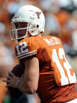 AUSTIN, TX - SEPTEMBER 26:  Quarterback Colt McCoy #12 of the Texas Longhorns drops back to pass against the UTEP Miners at Darrell K Royal-Texas Memorial Stadium on September 26, 2009 in Austin, Texas.  (Photo by Ronald Martinez/Getty Images)