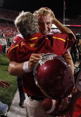COLUMBUS, OH - SEPTEMBER 12:  Head coach Pete Carroll hugs Matt Barkley #7 of the Southern California Trojans after defeating the Ohio State Buckeyes 18-15 on September 12, 2009 at Ohio Stadium in Columbus, Ohio.  (Photo by Gregory Shamus/Getty Images)