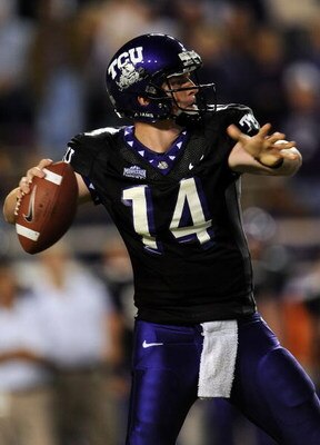 FORT WORTH, TX - OCTOBER 16:  Quarterback Andy Dalton #14 of the TCU Horned Frogs drops back to pass against the BYU Cougars in the first quarter at Amon G. Carter Stadium on October 16, 2008 in Fort Worth, Texas.  (Photo by Ronald Martinez/Getty Images)