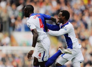 BLACKBURN, ENGLAND - SEPTEMBER 26:  Chris Samba of Blackburn celebrates scoring to make it 1-1 with team mate Pascal Chimbonda during the Barclays Premier League match between Blackburn Rovers and Aston Villa at Ewood Park on September 26, 2009 in Blackbu
