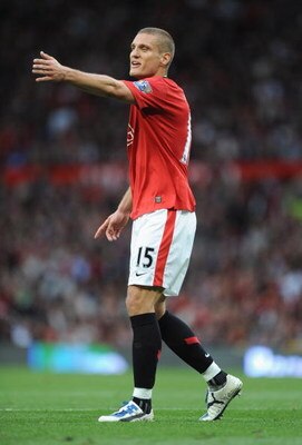 MANCHESTER, UNITED KINGDOM - AUGUST 29:   Nemanja Vidic of Manchester United gestures during the Barclays Premier League match between Manchester United and Arsenal at Old Trafford on August 29, 2009 in Manchester, England. (Photo by Laurence Griffiths/Ge