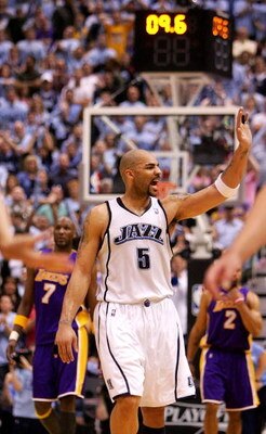 SALT LAKE CITY - MAY 09:  Carlos Boozer #5 of the Utah Jazz celebrates against the Los Angeles Lakers in Game Three of the Western Conference Semifinals during the 2008 NBA Playoffs on May 9, 2008 at Energy Solutions Arena in Salt Lake City. NOTE TO USER: