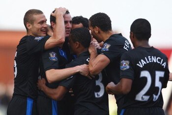 STOKE ON TRENT, ENGLAND - SEPTEMBER 26:  John O'Shea of Manchester Unted celebrates his goal with team mates during the Barclays Premier League match between Stoke City and Manchester United at the Britannia Stadium on September 26, 2009 in Stoke on Trent