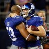 ARLINGTON, TX - SEPTEMBER 20:  Kicker Lawrence Tynes #9 and Bryan Kehl #53 of the New York Giants at Cowboys Stadium on September 20, 2009 in Arlington, Texas.  (Photo by Ronald Martinez/Getty Images)