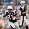 FOXBORO, MA - SEPTEMBER 27:  Fred Taylor #21 of the New England Patriots carries the ball after the handoff from Tom Brady #12 in the fourth quarter against the Atlanta Falcons on September 27, 2009 at Gillette Stadium in Foxboro, Massachusetts. The Patri