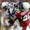 GLENDALE, AZ - SEPTEMBER 27:  Pierre Garcon #85 of the Indianapolis Colts runs after a catch in the fourth quarter as he battles for more yards against Dominique Rodgers-Cromartie #29 of the Arizona Cardinals during the game at University of Phoenix Stadi
