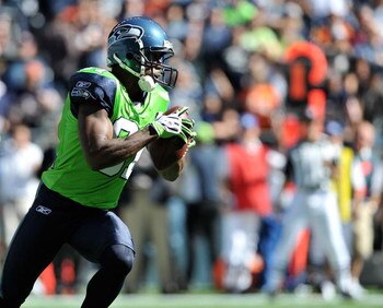 SEATTLE - SEPTEMBER 27:  Wide receiver Nate Burleson #81 of the Seattle Seahawks rushes against the Chicago Bears on September 27, 2009 at Qwest Field in Seattle, Washington. The Bears defeated the Seahawks 25-19. (Photo by Otto Greule Jr/Getty Images)