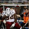 DETROIT, MI - SEPTEMBER 27: Defensive tackle Albert Haynesworth #92 of the Washington Redskins sits on a cart as he is taken off the field after an injury in the first half against the Detroit Lions at Ford Field on September 27, 2009 in Detroit, Michigan