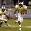 ORLANDO, FL - OCTOBER 20:  Defensive back Joe Burnett #19 of the University of Central Florida Golden Knights returns a kick against the Tulsa Golden Hurricane at Bright House Stadium on October 20, 2007 in Orlando, Florida.  (Photo by Al Messerschmidt/Ge