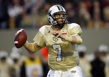 MEMPHIS, TN - DECEMBER 29:  Kyle Israel #7 of the UCF Knights looks to throw downfield against the Mississippi State Bulldogs during the 49th Annual Autozone Liberty Bowl at Liberty Bowl Memorial Stadium December 29, 2007 in Memphis, Tennessee.  (Photo by