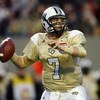 MEMPHIS, TN - DECEMBER 29:  Kyle Israel #7 of the UCF Knights looks to throw downfield against the Mississippi State Bulldogs during the 49th Annual Autozone Liberty Bowl at Liberty Bowl Memorial Stadium December 29, 2007 in Memphis, Tennessee.  (Photo by