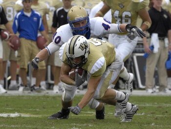 ORLANDO, FL - OCTOBER 20: Linebacker Tanner Antle #40 of the Tulsa Golden Hurricane defends against wide receiver Rocky Ross #5 of the University of Central Florida Knights at Bright House Stadium on October 20, 2007 in Orlando, Florida.  UCF won 44 - 23.