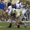 ORLANDO, FL - OCTOBER 20: Linebacker Tanner Antle #40 of the Tulsa Golden Hurricane defends against wide receiver Rocky Ross #5 of the University of Central Florida Knights at Bright House Stadium on October 20, 2007 in Orlando, Florida.  UCF won 44 - 23.
